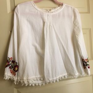Embroidered sleeve white long sleeve top